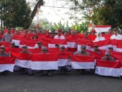 Bagikan Bendera Merah Putih Saat Pimpin Apel Gabungan, Ini Kata Asmawa Tosepu 